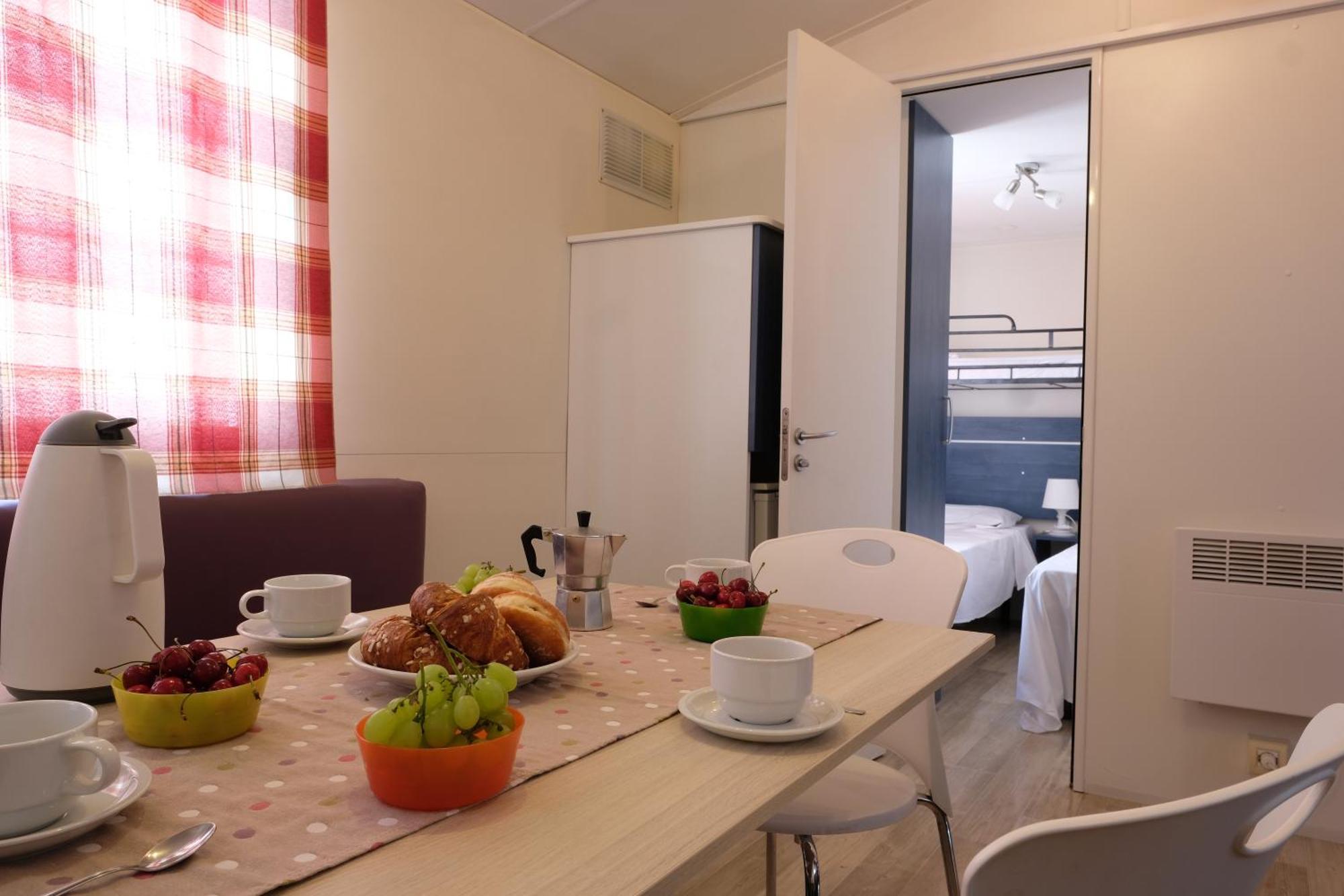 Happy Camp Mobile Homes In Camping Village Baia Paradiso Badesi Exterior foto